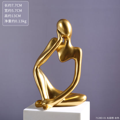 Escultura abstrata dourada com marcação de medidas na foto de especificação — Mova Decor