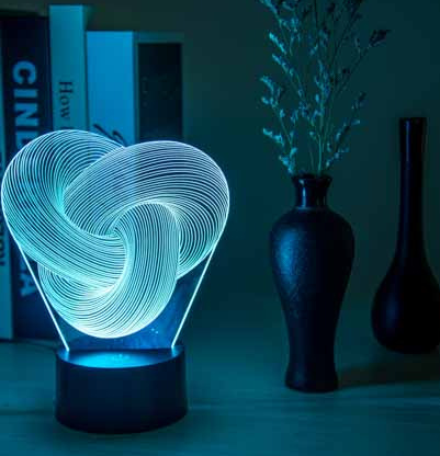 Luminária de toque 3D Mōva acesa no quarto