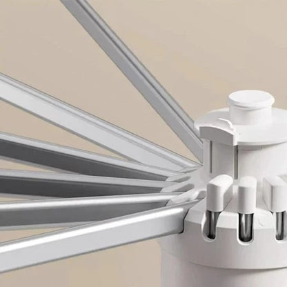 SpinDry Flex™ – Varal Dobrável Giratório de Chão com 16 Hastes em Aço Inox - Mōva Decor