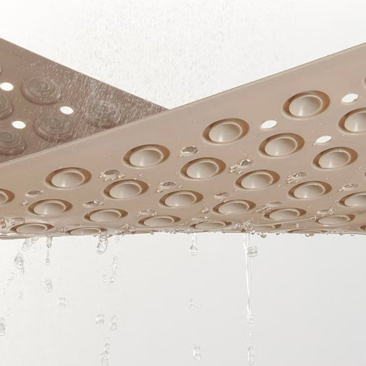 Detalhe do material em PVC do tapete de banheiro Mōva